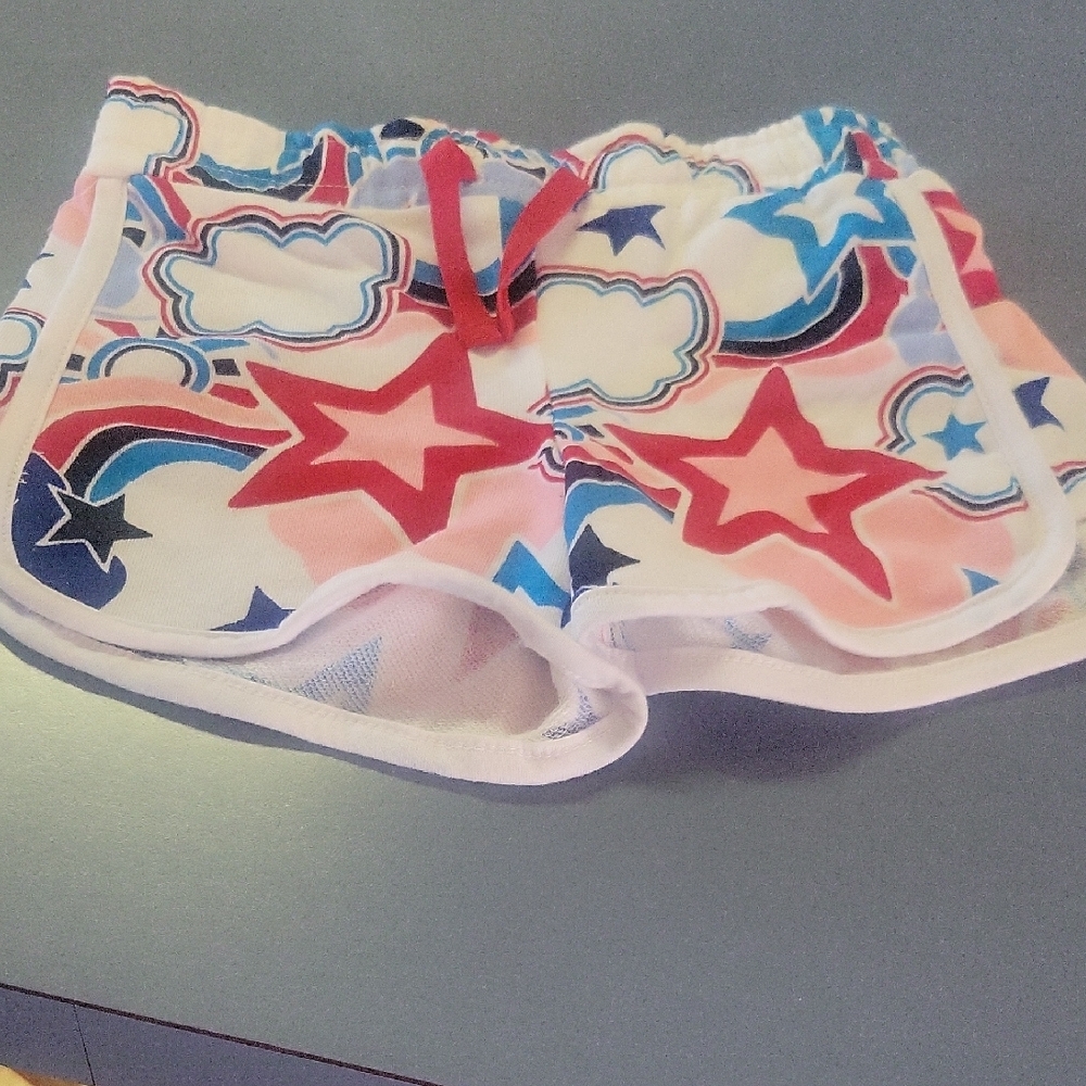 Red and Blue Athletic Shorts with Dynamic Star Pattern